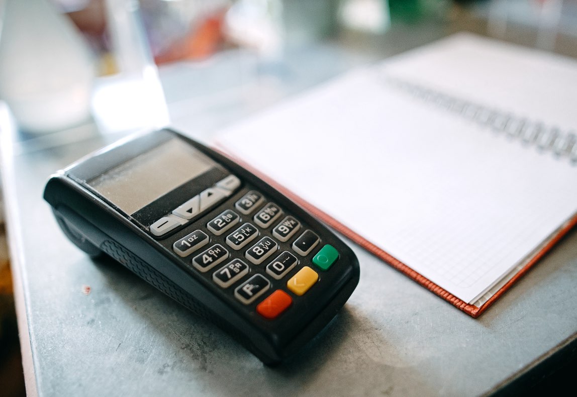 Credit card scanner on table